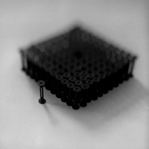 <body>
<p>This work was initially conceived of as a nod to the Terracotta Army of the Qin Emperor. Seeing that the film size ‘120’ for which these spools were manufactured is numerically 11²-1, I arranged this as a phalanx of 11 ranks of 11 and left the centre element out.</p>
<p>I thought I could also look at this omission as a flaw in the lattice and to see how the structure behaved over time, perhaps to model the corruption of power while I worked on the Dissent project with Chapel Arts. </p>
</body>
 Images Copyright Aldobranti® ©2008-'2025. All rights reserved.